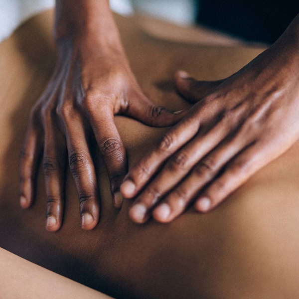 Therapist giving a massage tailored to cancer patients