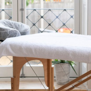 Portable massage table for at-home treatment