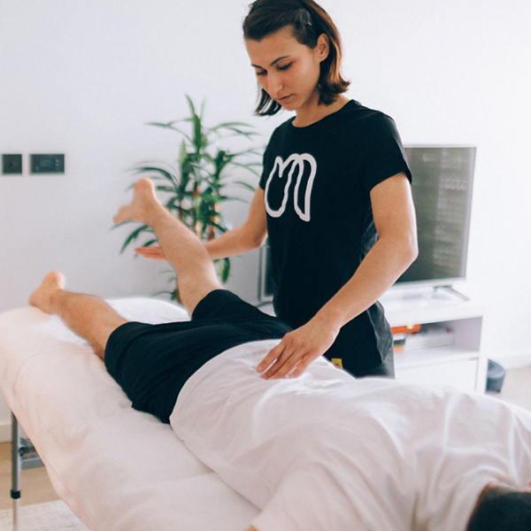 Therapist giving a patient an injury massage